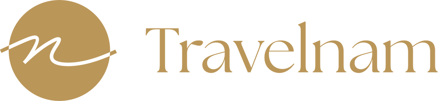 Travelnam logo with a gold circular icon and serif wordmark on a white background