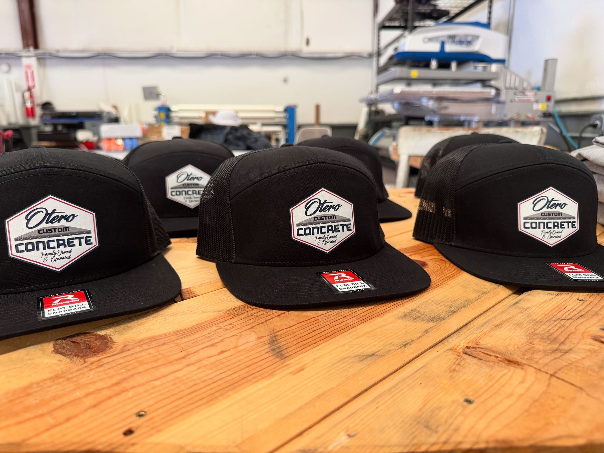 Black hats with white logo 