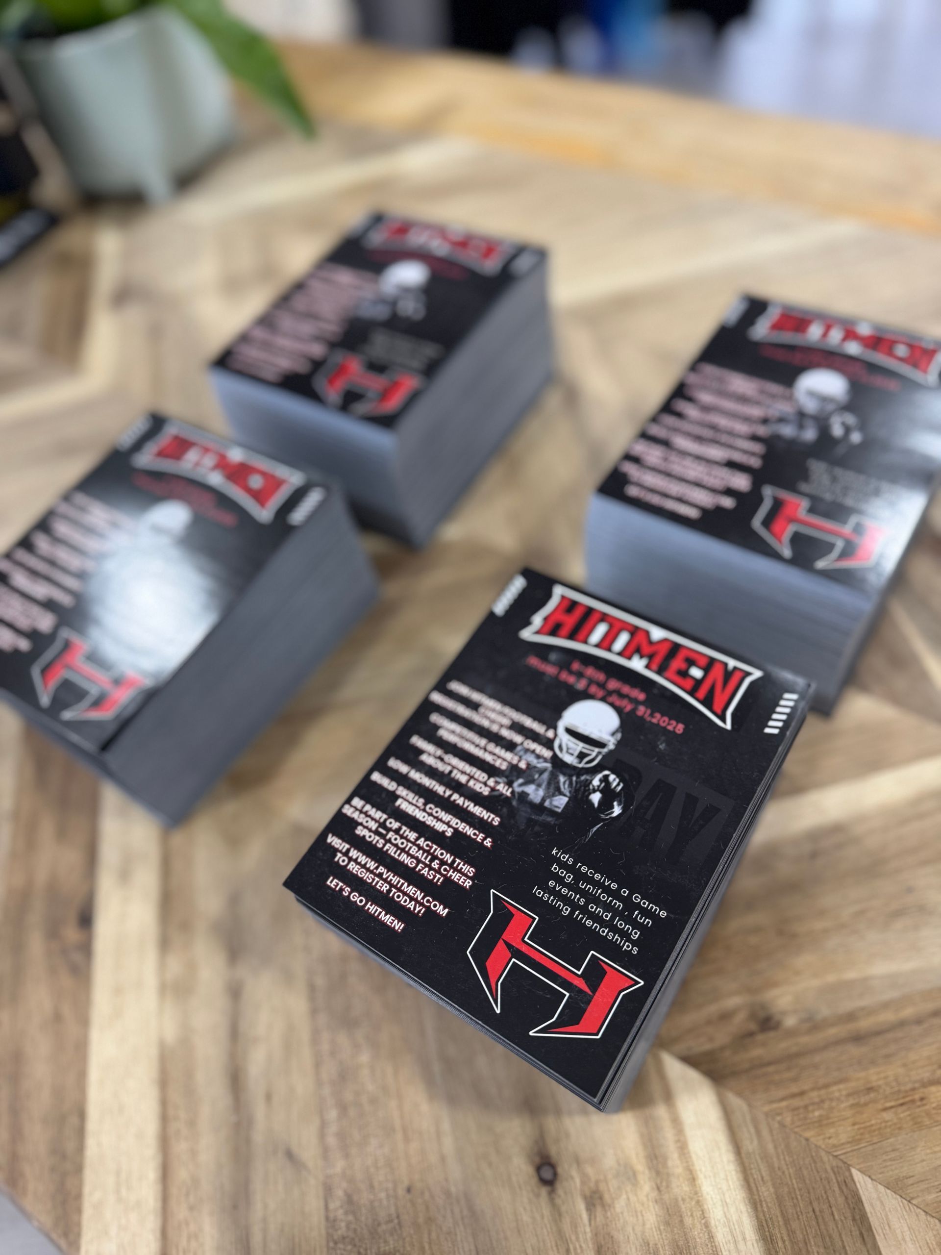 Stacks of business cards with a red and black 