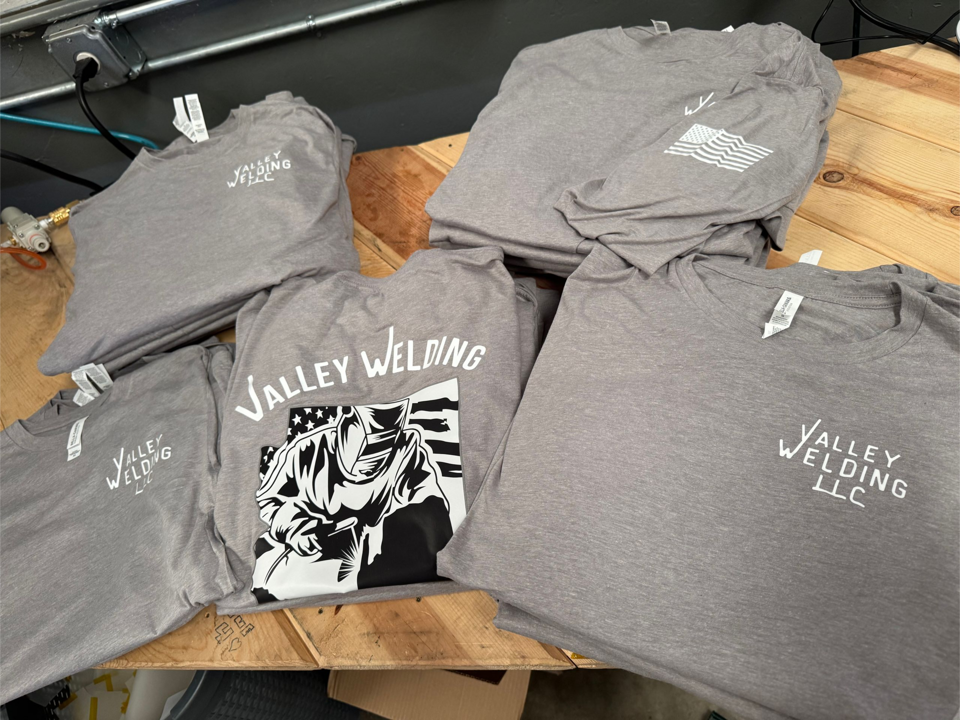 Grey t-shirts with the text 