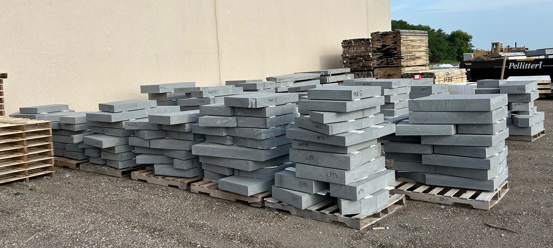 An image of stacks of pavers, all cut to their unique sizes, stacked outside of the Quarra Stone Co. facility in Madison, Wis.