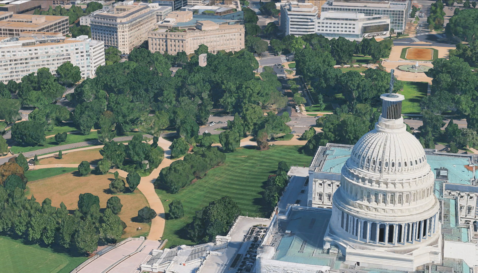 An overhead view of the future site of Peace corps Park on Louisiana Ave. in Washington, D.C. with the U.S. Capitol dome in the foreground