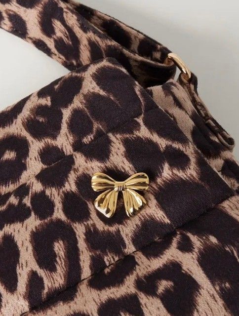 Broche strik goud of zilver