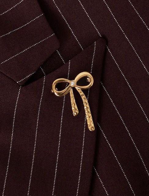 Broche strik groot goud of zilver