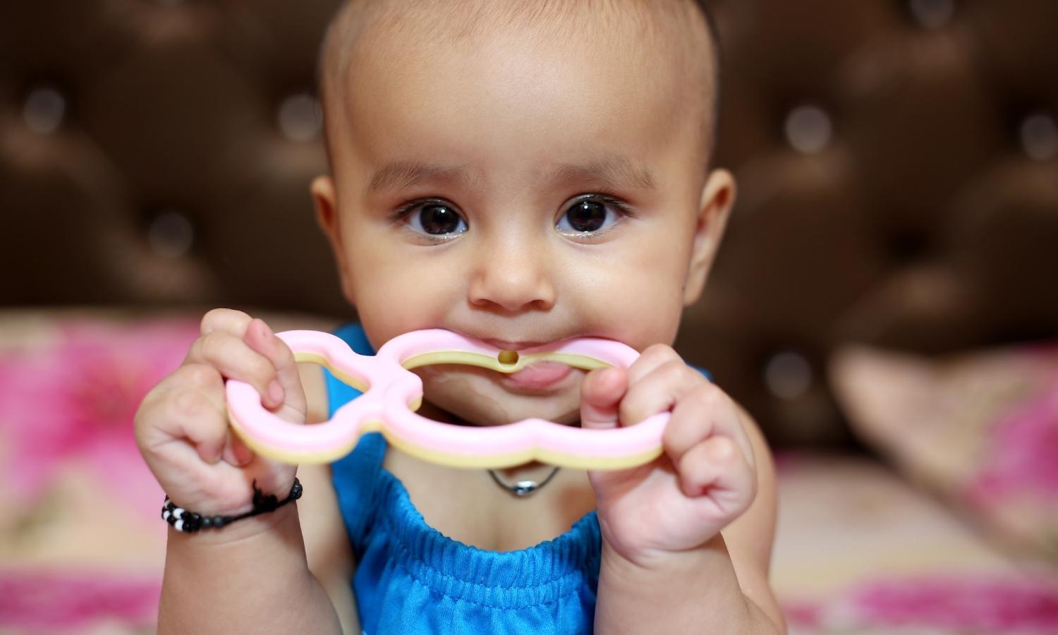 Young girl teething