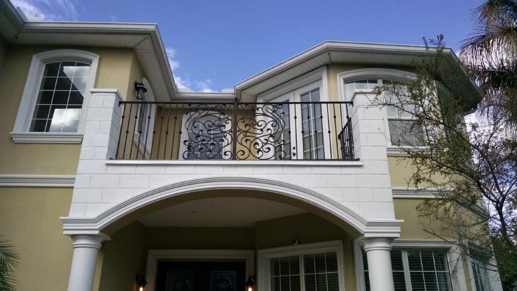 New balcony railing installed during a home improvement project in Tampa, Florida.