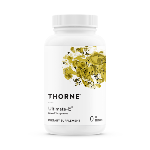 Thorne Ultimate-E supplement bottle with white cap and yellow-green botanical design on label