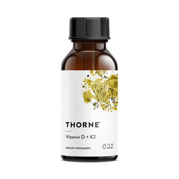 Thorne Vitamin D + K2 supplement bottle with amber glass and black cap