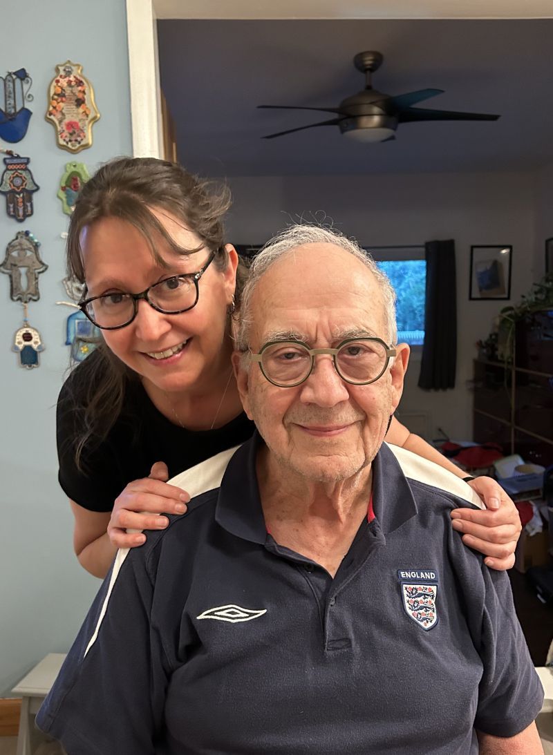 Karen Parnes smiles behind her father