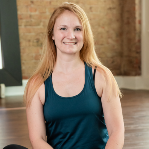 Cat Breyfogle, an ERYT200 and RYT500 certified yoga instructor specializing in healing, restorative, and empowering practices.