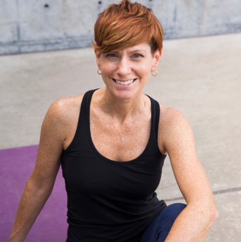 Jenn Usherr-Davis, a 500RYT yoga instructor, Ayurvedic counselor, and massage therapist focused on mind-body balance.
