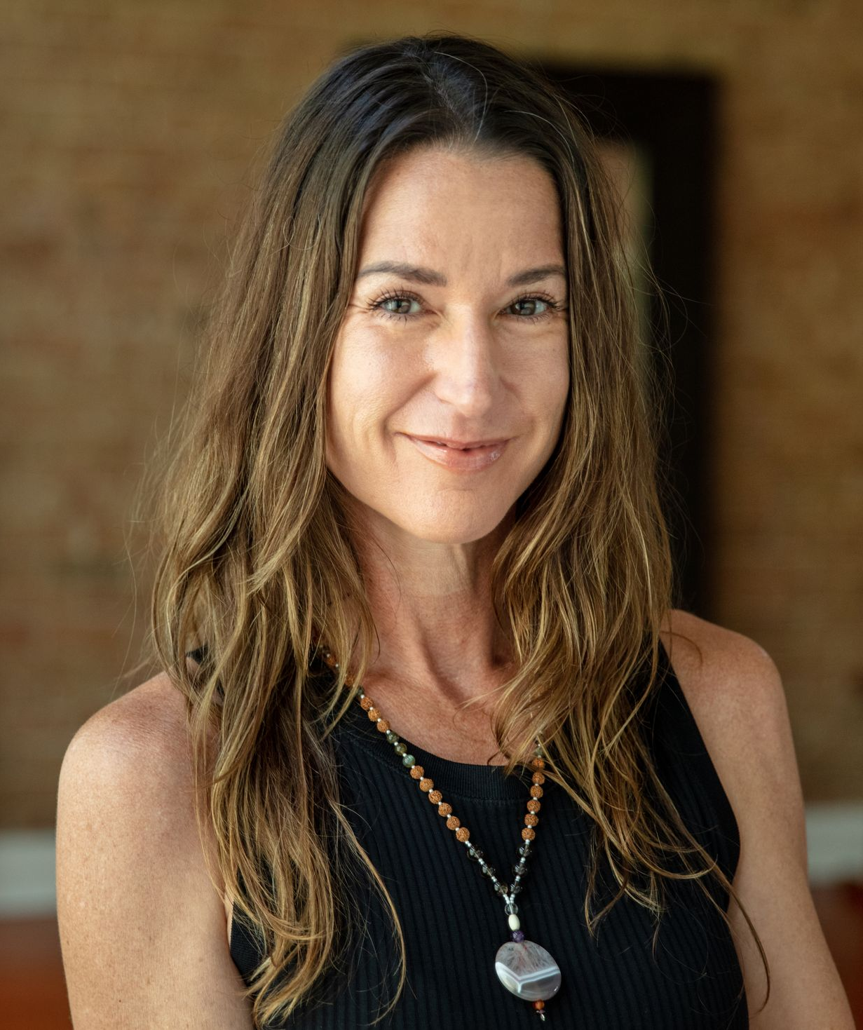 Jennifer Chitwood, founder of Uptown Yoga, offering expert consultation calls.