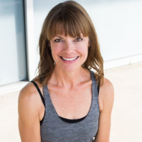Lisa Coyle, a 500 E-RYT certified yoga instructor, Ayurvedic Yoga Specialist, and holistic health coach.