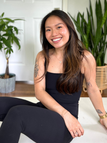 Uptown Yoga instructor Mai Nguyen, a 500HR RYT, specializing in accessible Vinyasa flow, anatomical alignment, and yoga for climbers in Dallas.
