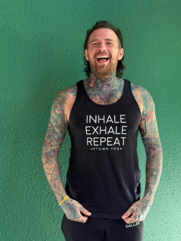 Portrait of Uptown Yoga instructor Sean Beiersdorfer, a 300-hour certified teacher blending Ashtanga lineage with dynamic vinyasa movement in Dallas.