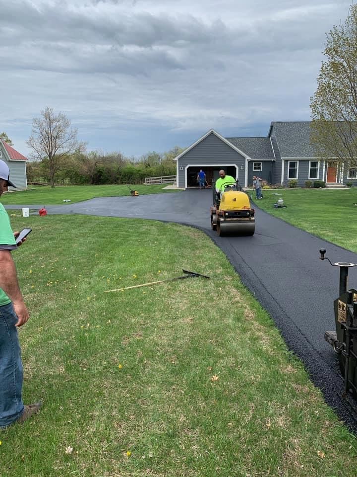 Workers Doing Their Work In Front Of A House | Middletown, OH | Affordable Paving Company