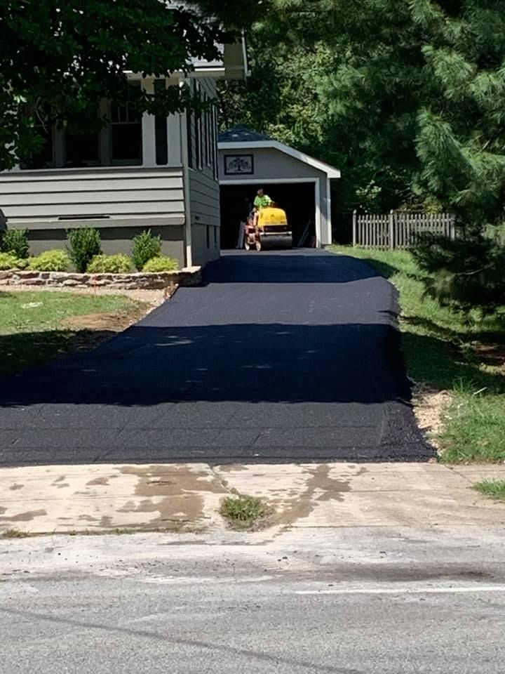 A Mini Car Is Parked In A Garage Next To A Driveway | Middletown, OH | Affordable Paving Company