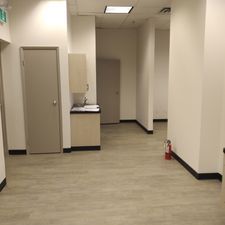 There is a fire extinguisher in the middle of the room.