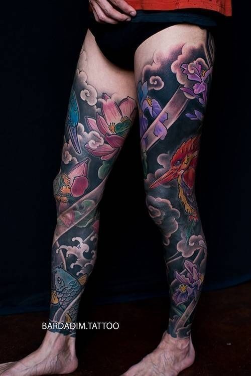 A person with a tattoo on their leg is wearing underwear.