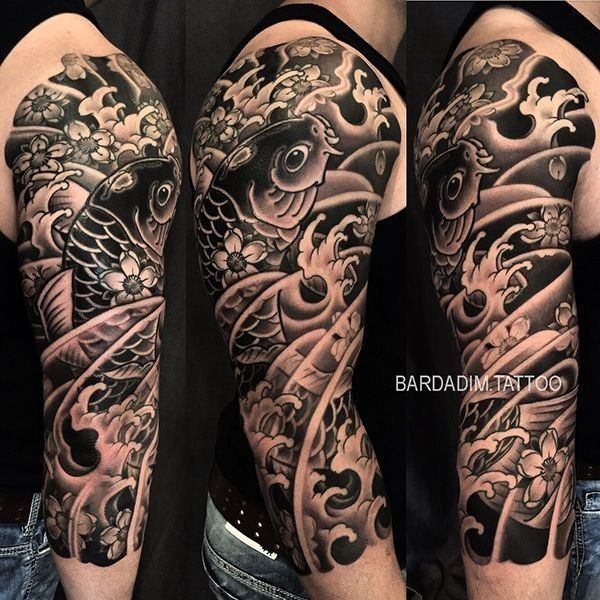 Black and grey koi fish tattoo sleeve with water and floral details.