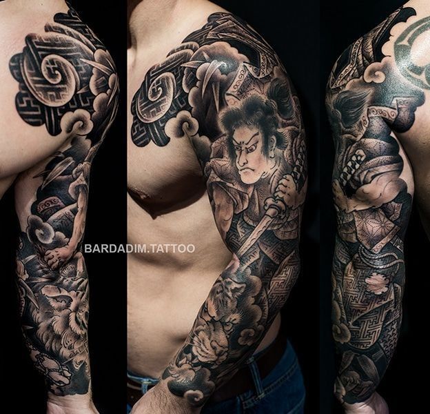 A man has a tattoo of a samurai on his arm
