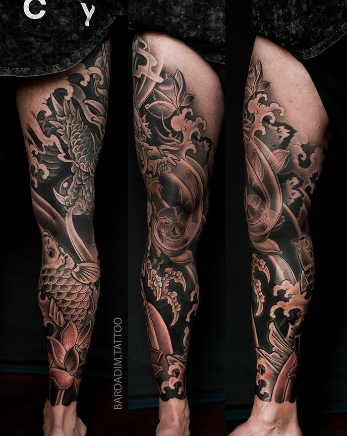 Black and gray Japanese-style leg sleeve Irezumi tattoo featuring koi fish, water waves, and lotus flowers. NYC