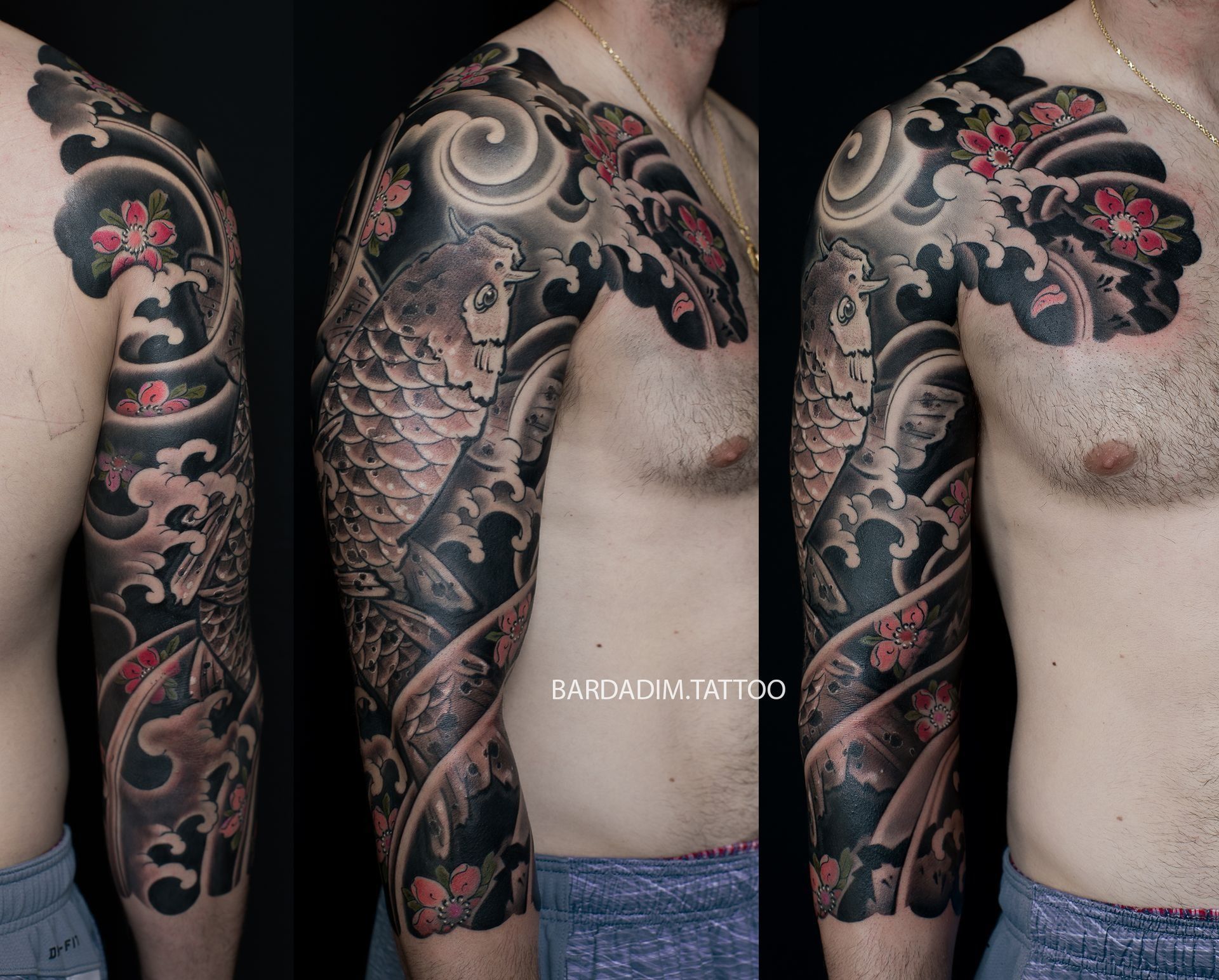 Tattooed arm and torso with a koi fish, waves, and floral design in black, gray, and red.