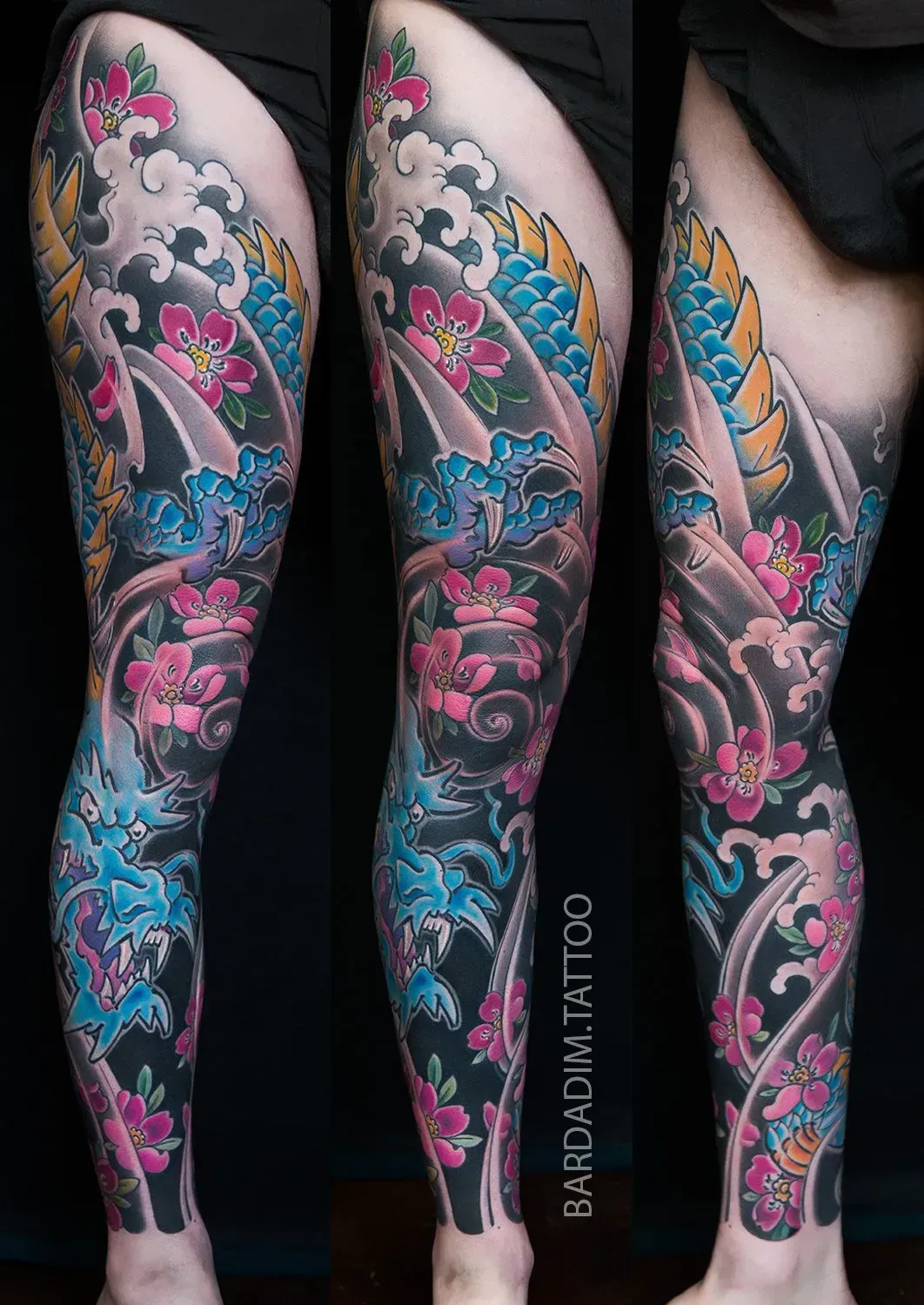 Colorful leg tattoo featuring koi fish, cherry blossoms, and swirling waves.