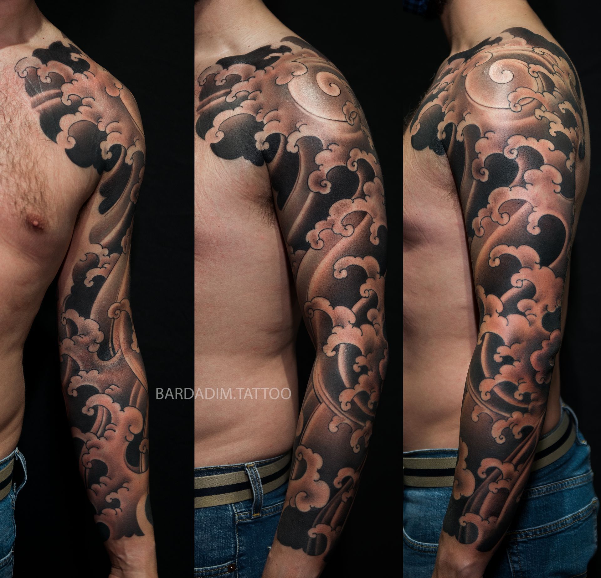 Tattoo of stylized ocean waves in black and gray, covering a man's arm.