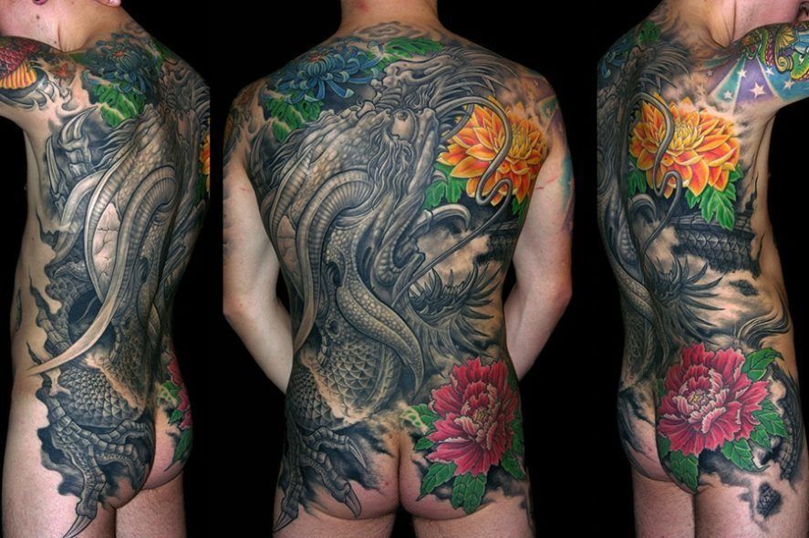 Full body tattoo: dragon, flowers, and foliage in color on a person's back; three angles.