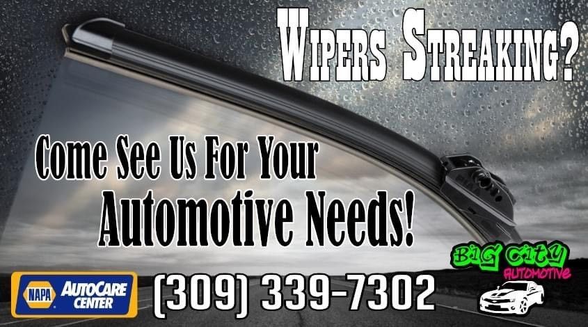 An ad for car repair services. It shows a windshield wiper and text that says, 