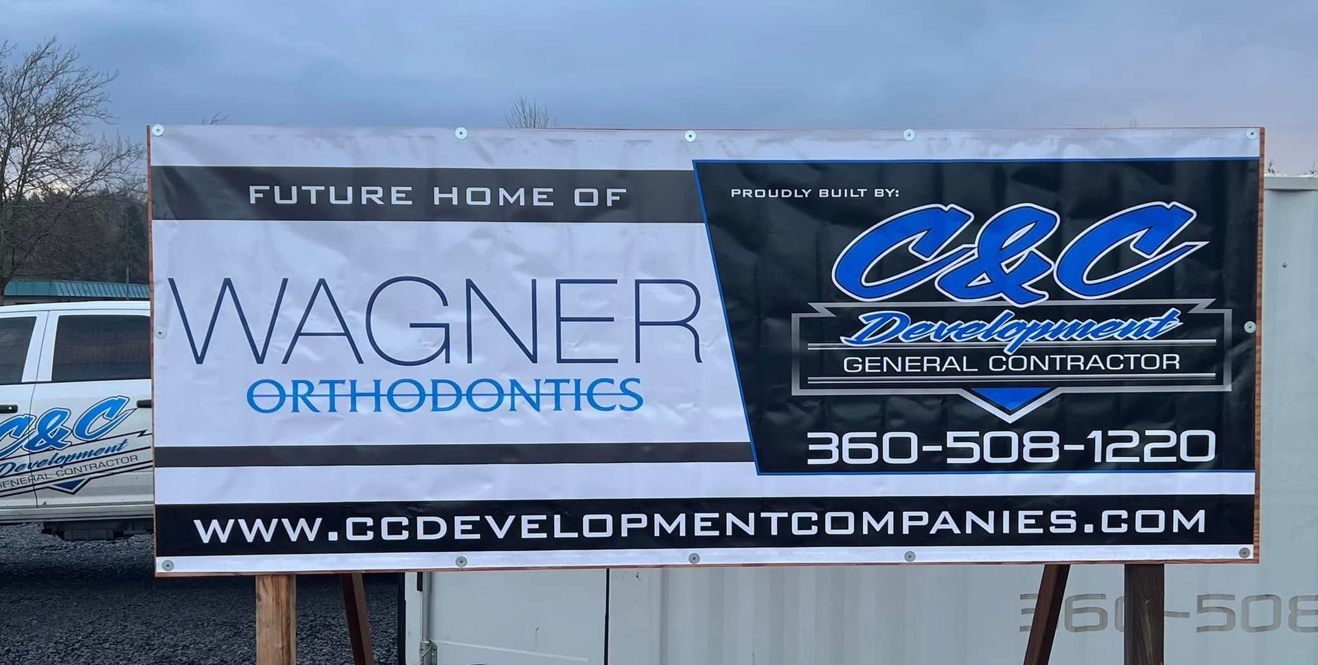 Banner for Wagner Orthodontics and CCC Development Companies with blue and white text, phone number, and website