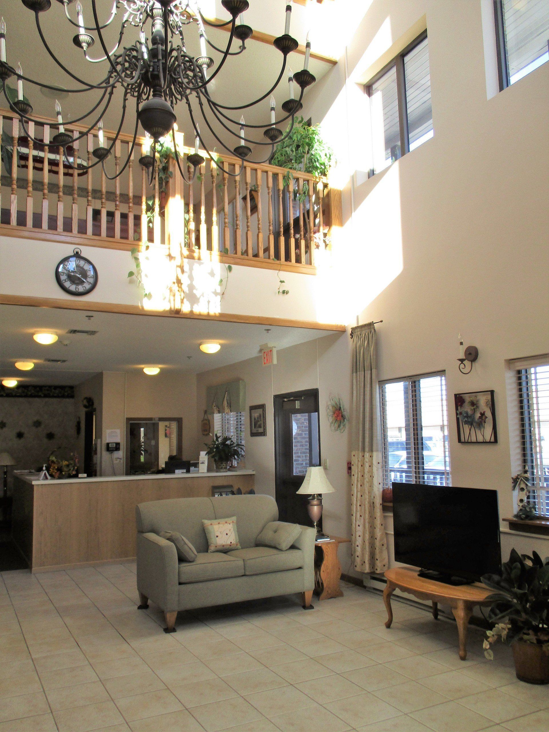 A living room with a couch and a television
