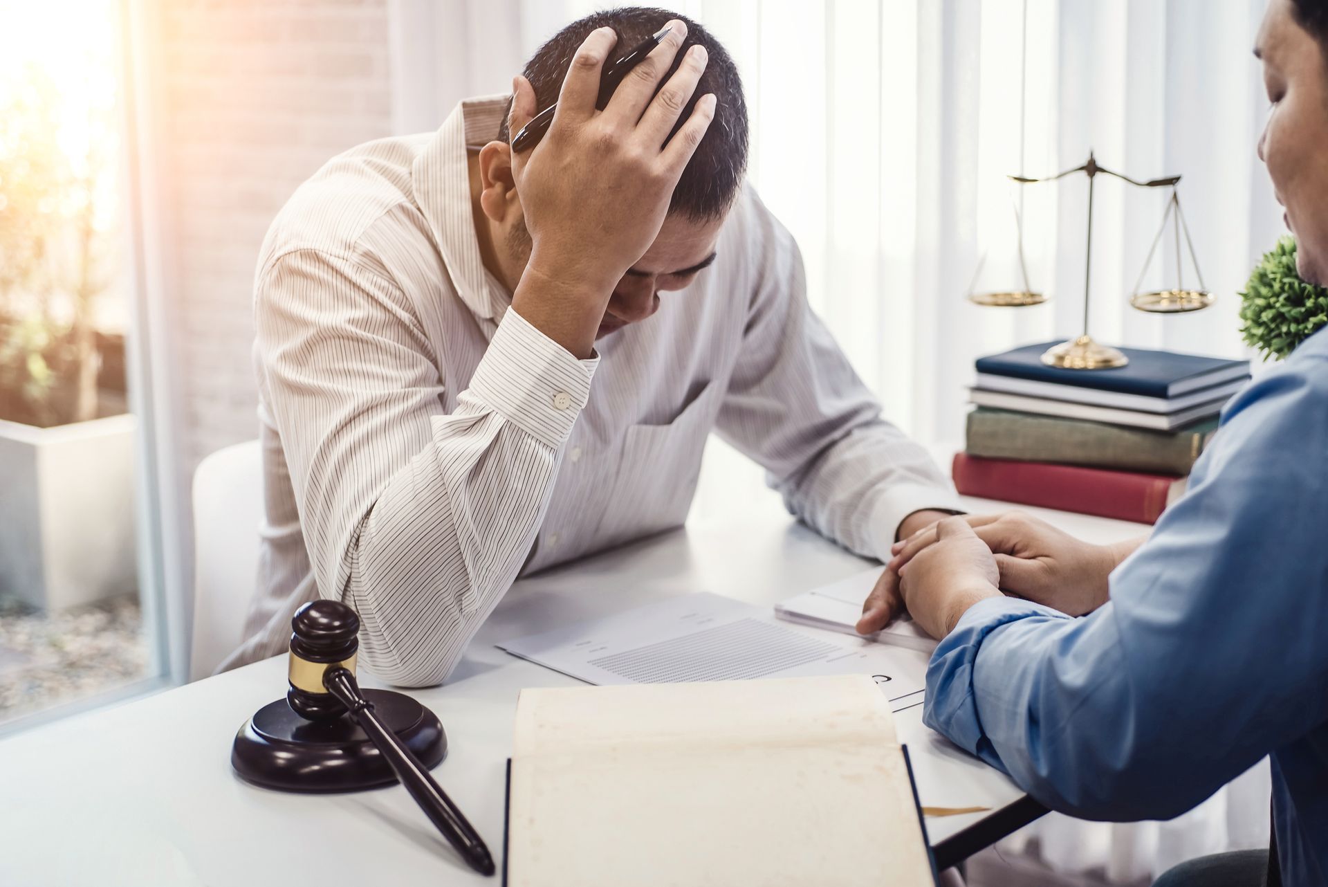 An attorney from Allen D. Arnold Attorney at Law in Montgomery, AL, is discussing a discrimination l