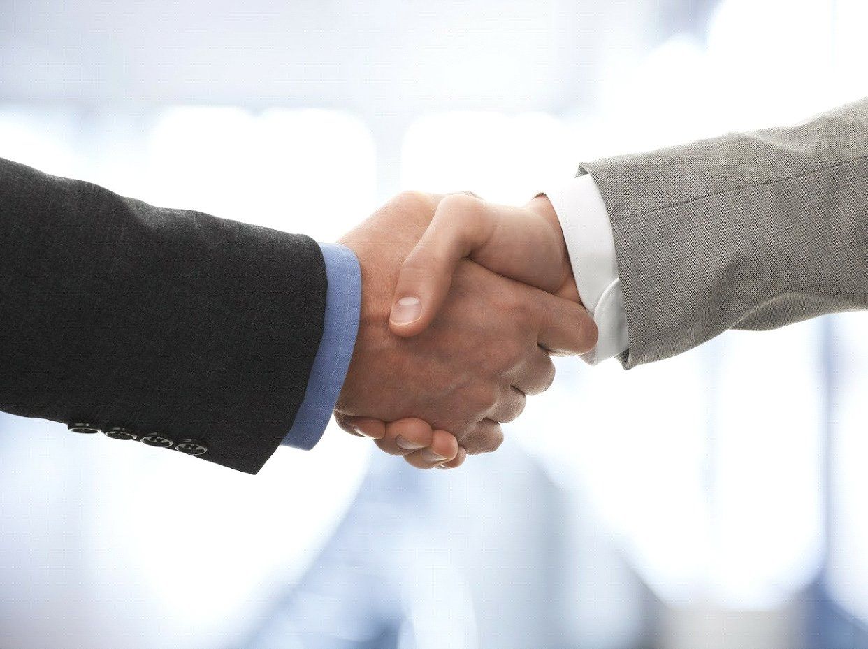 Business Man Shaking Hands — Birmingham, AL — Allen D. Arnold Attorney at Law