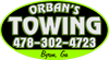 Orban's Towing logo: green and black oval with white text and phone number, "Byron, GA" at the bottom.