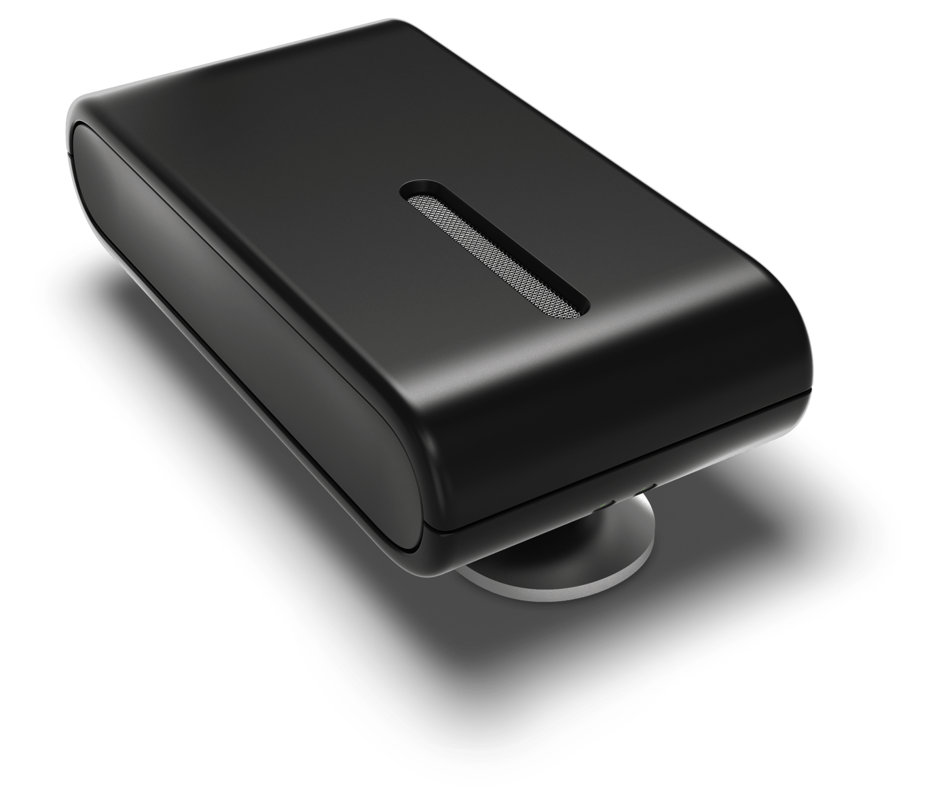 A small black box with a hole in the middle sits on a white surface
