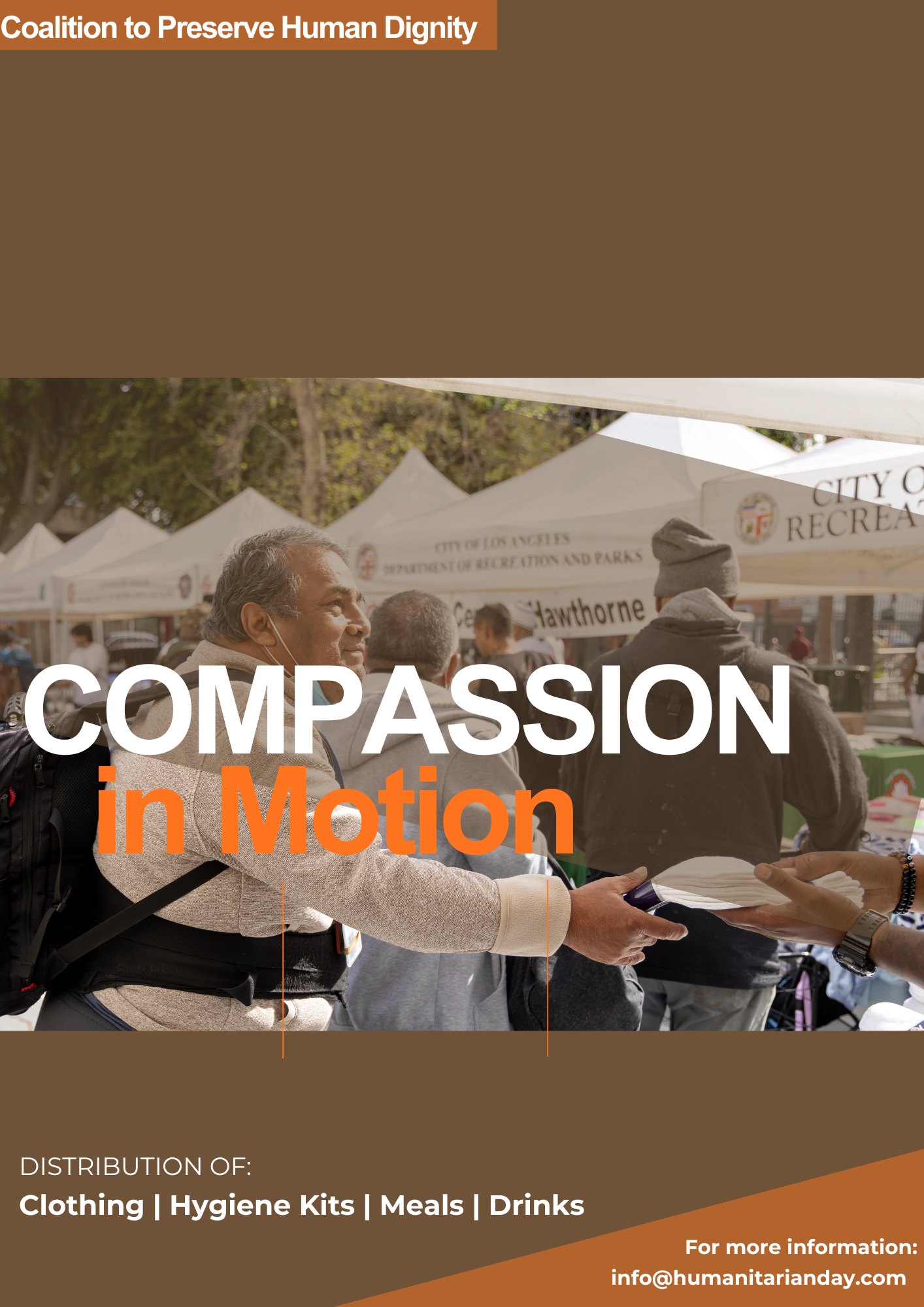 People receiving food at an outdoor event with a banner that reads