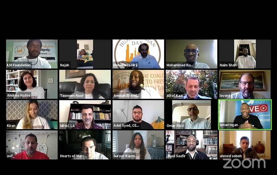 A virtual meeting with a grid of diverse participants on a Zoom call.