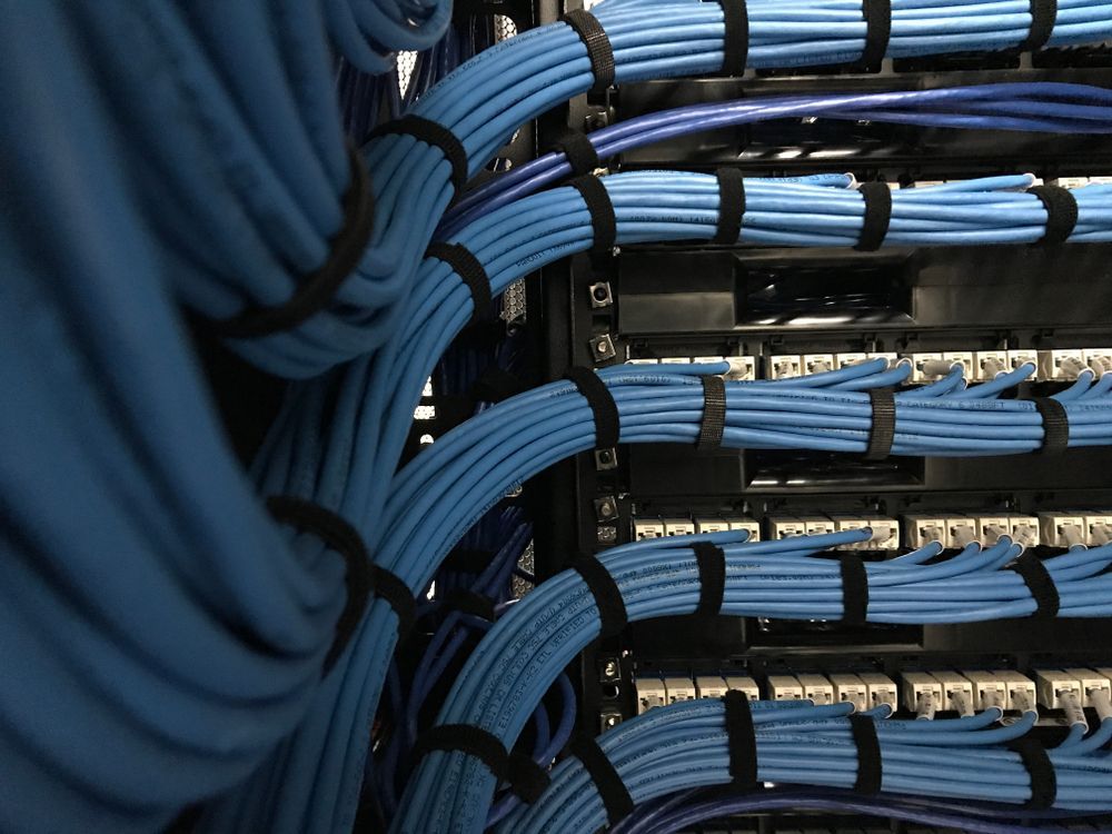 A Bunch of Blue Wires Are Connected to Each Other — Cambush Security Solutions NT in Alice Springs, NT