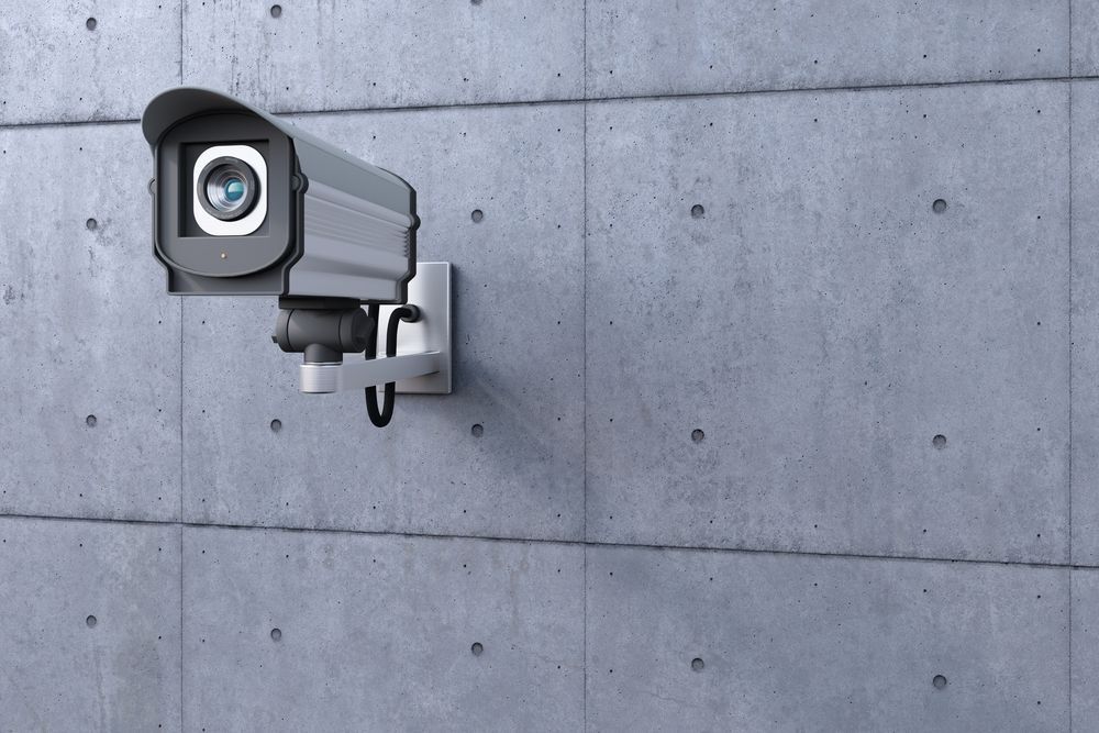 A Security Camera is Mounted to a Concrete Wall — Cambush Security Solutions NT in Katherine, NT