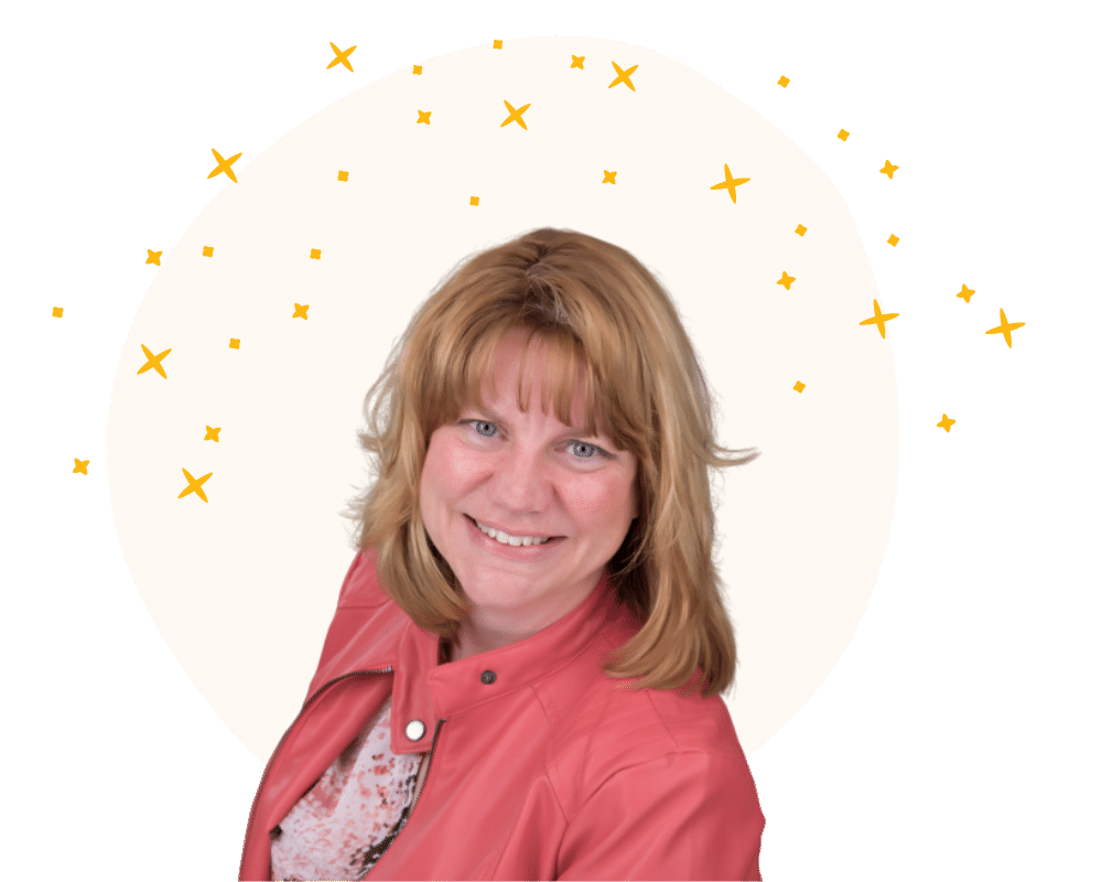 A woman in a red jacket is smiling in front of a white background with stars.