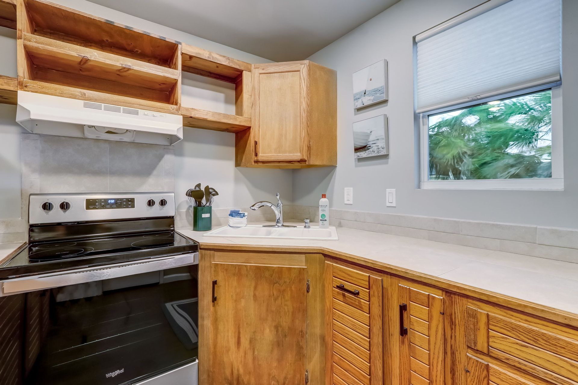 Full size kitchen with microwave, stainless steel appliances