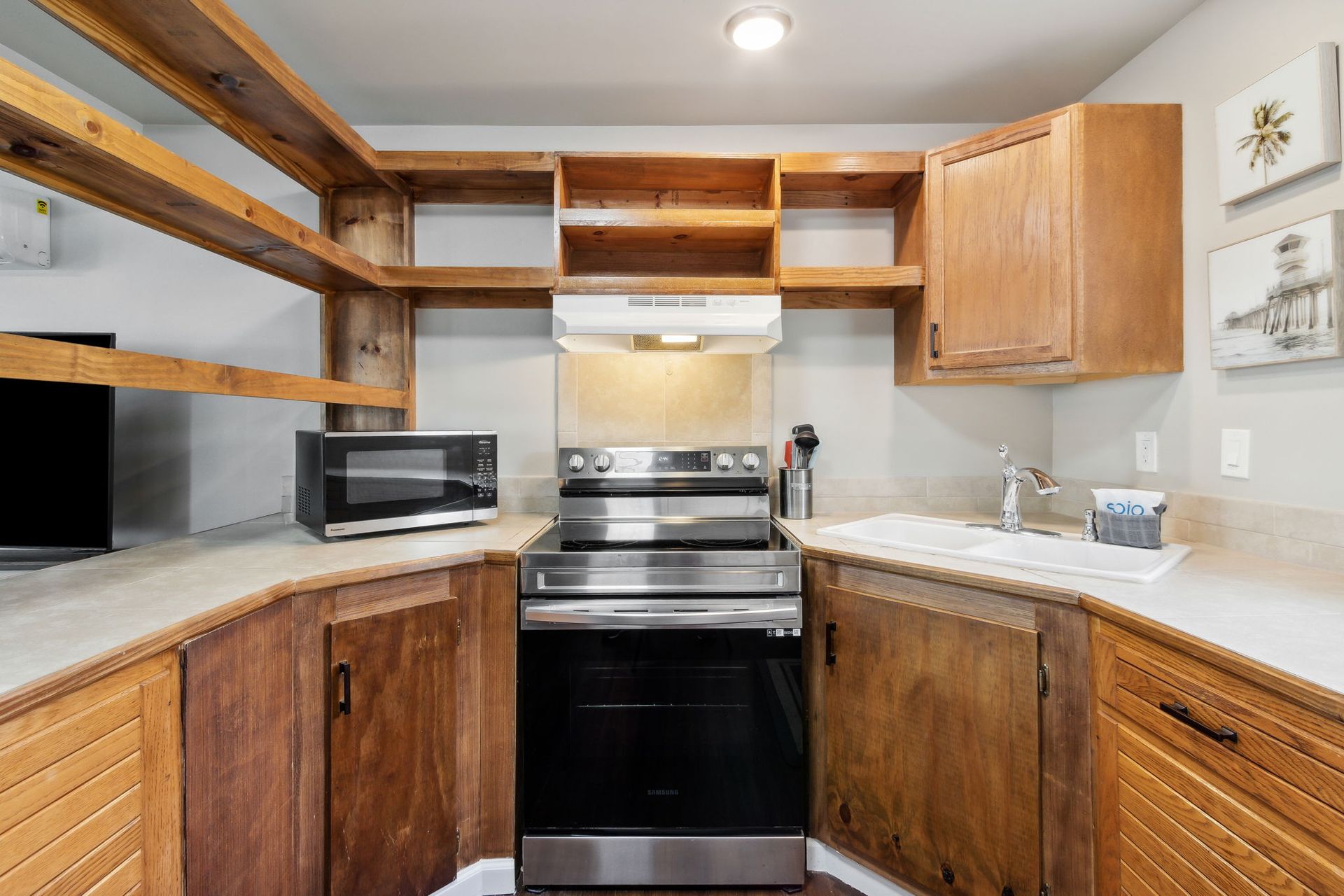Full kitchen with wooden cabinets