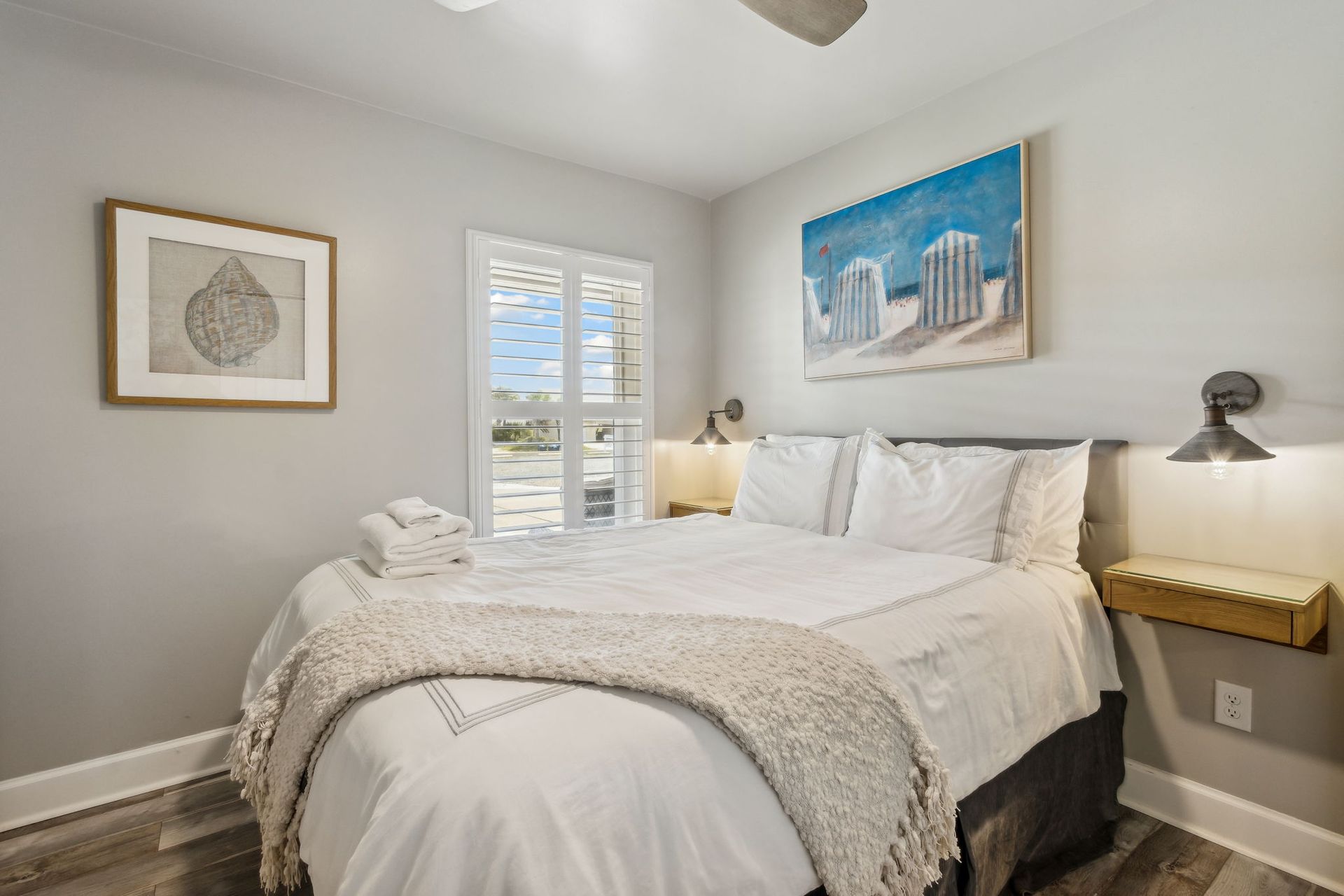 Bedroom with a queen size bed, stearns and foster mattress, a dresser and a large closet