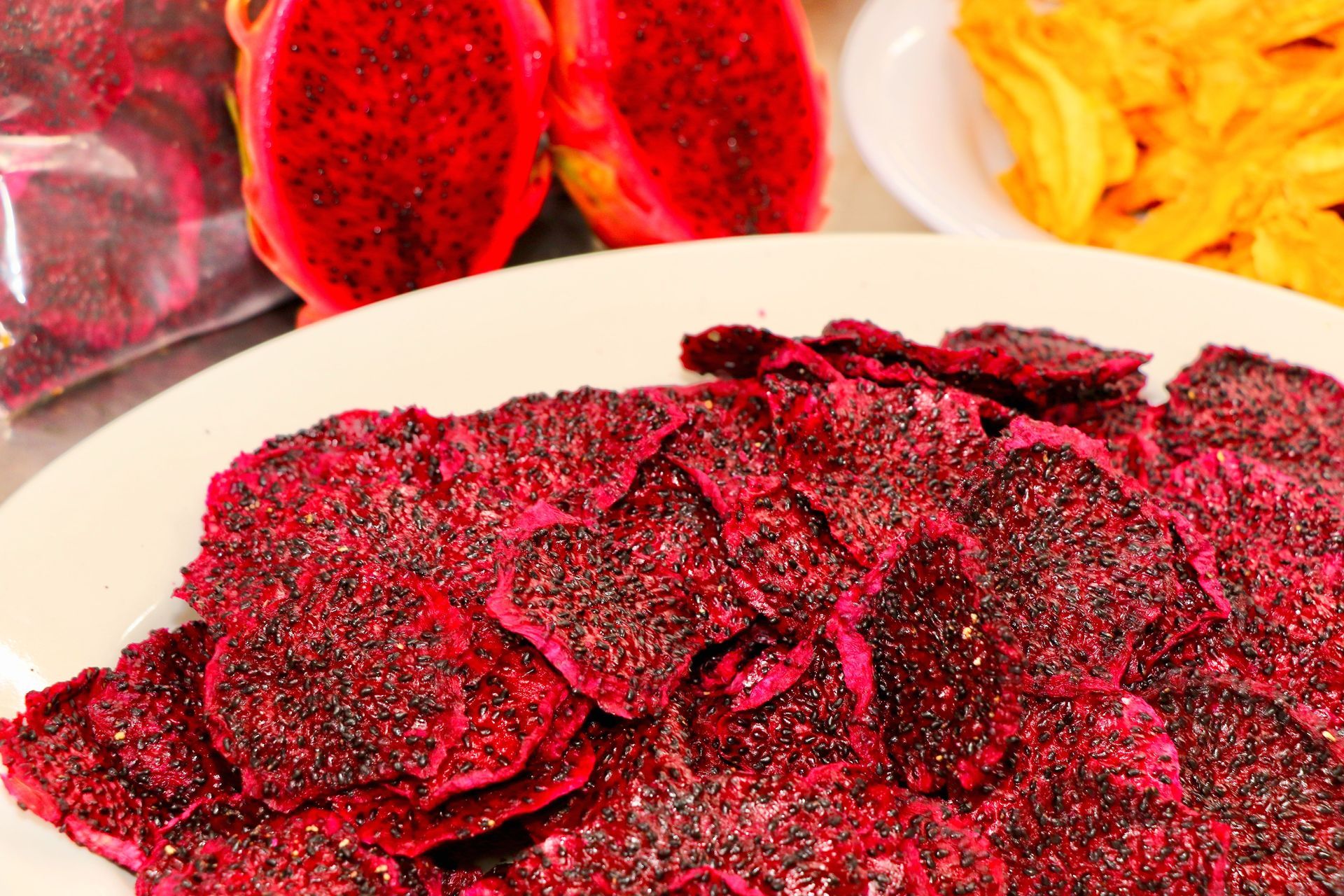 A Dragon Fruit Cut in Half Is on A Plate Dried Out — Mareeba Golden Dried Mangoes in Mareeba, QLD