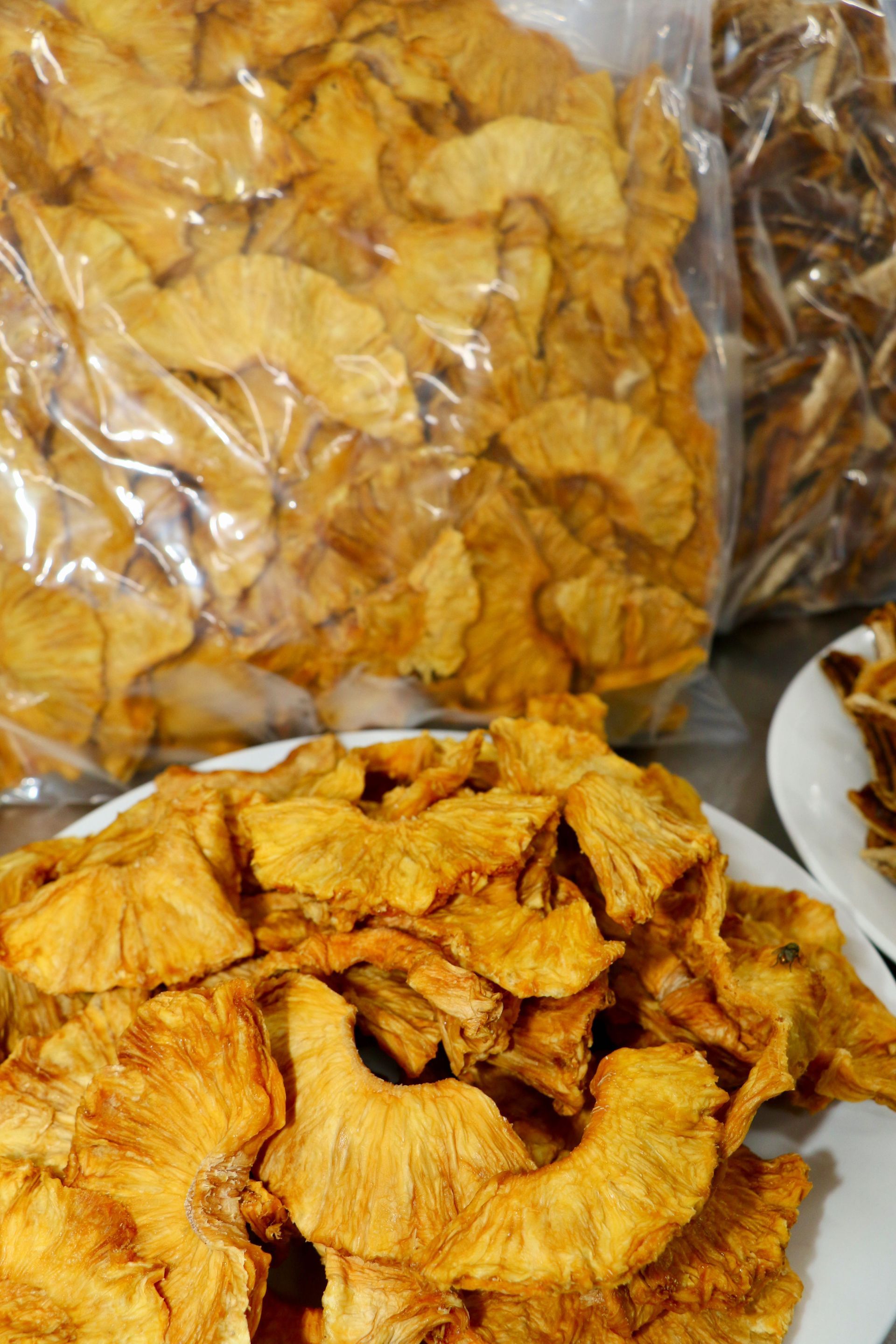 Dried Pineapple Slices on A Plate — Mareeba Golden Dried Mangoes in Mareeba, QLD