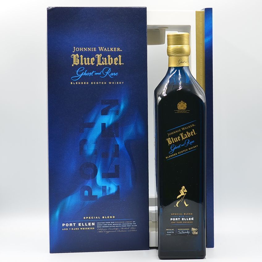 A bottle of johnnie walker blue label next to its box