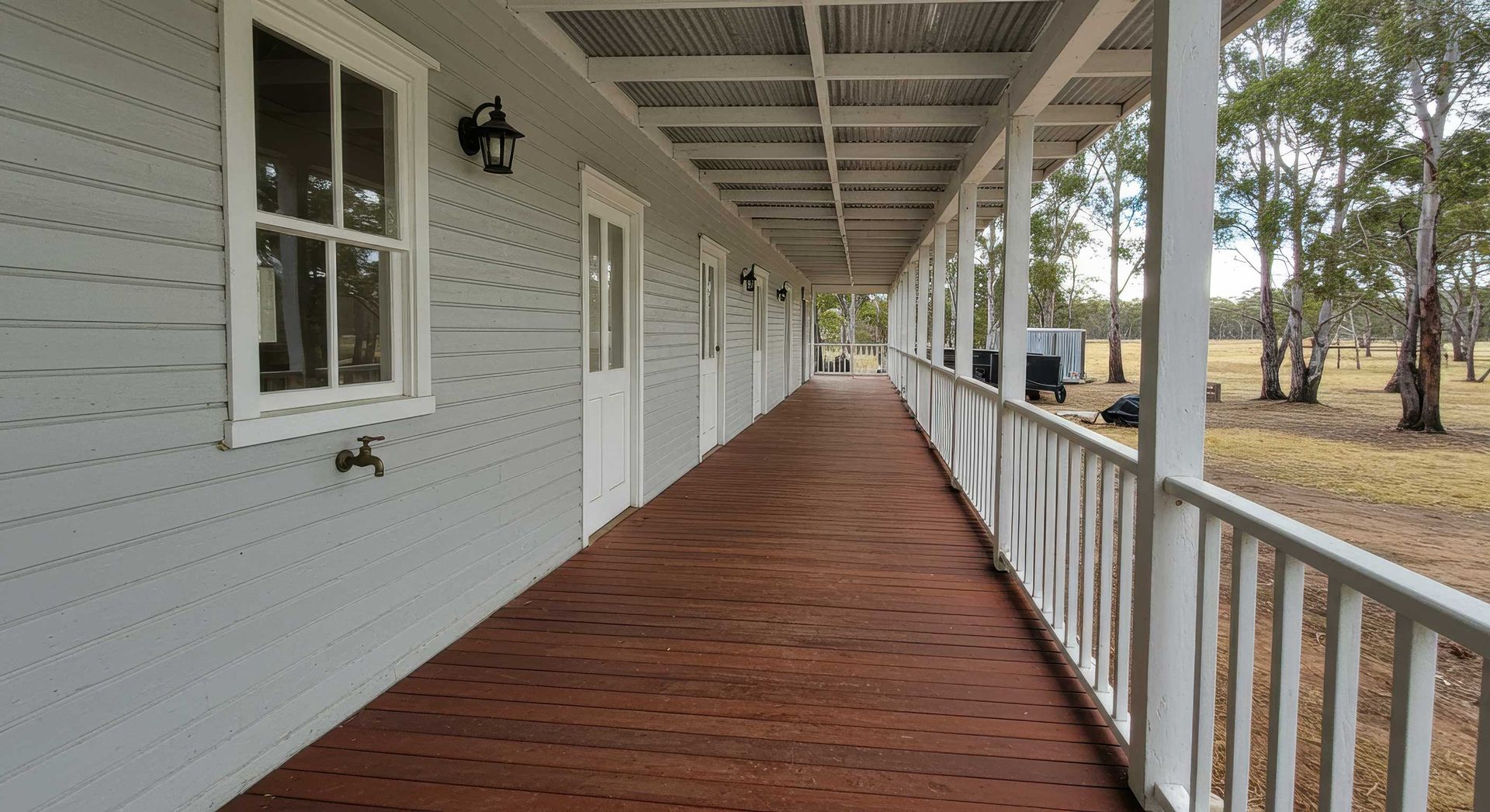 Modern White Fence After Exterior Paint Job in Gladstone