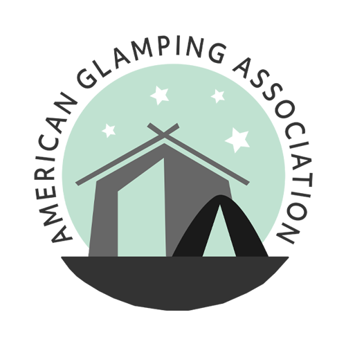 The logo for the american glamping association shows a tent and a house.
